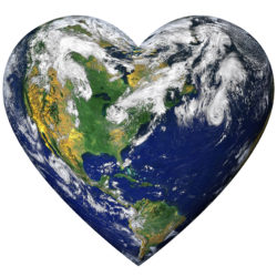 The planet earth shaped as a heart and isolated from the background with a clipping path.